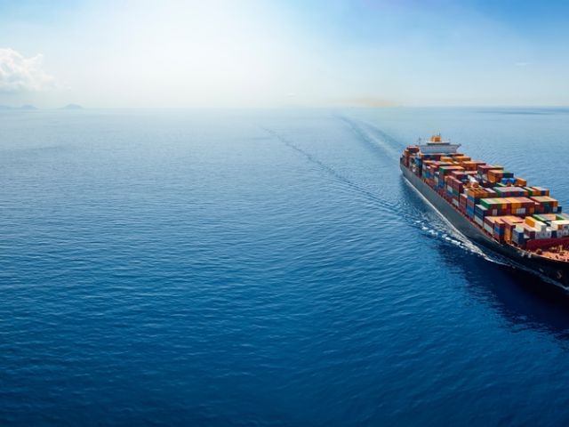 Aerial,Panorama,Of,A,Cargo,Ship,Carrying,Container,For,Import